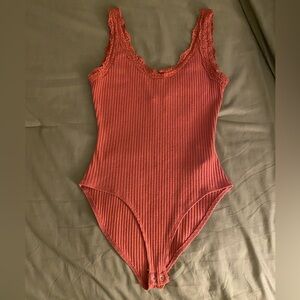 Forever21 bodysuit. Size small. Rust/Orange color.